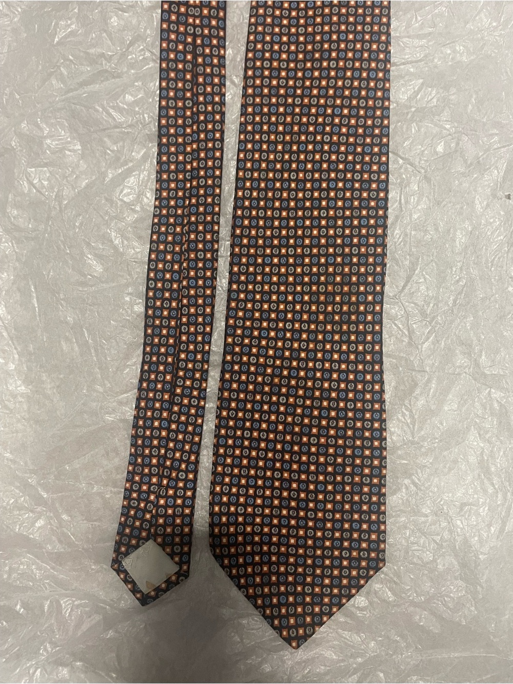 Men's Navy Tie with Orange and White Micro Medallion Pattern